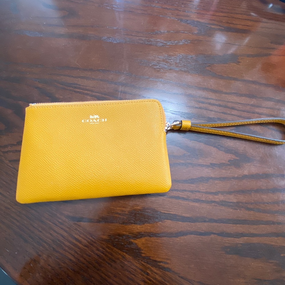 Coach wristlet mustard color